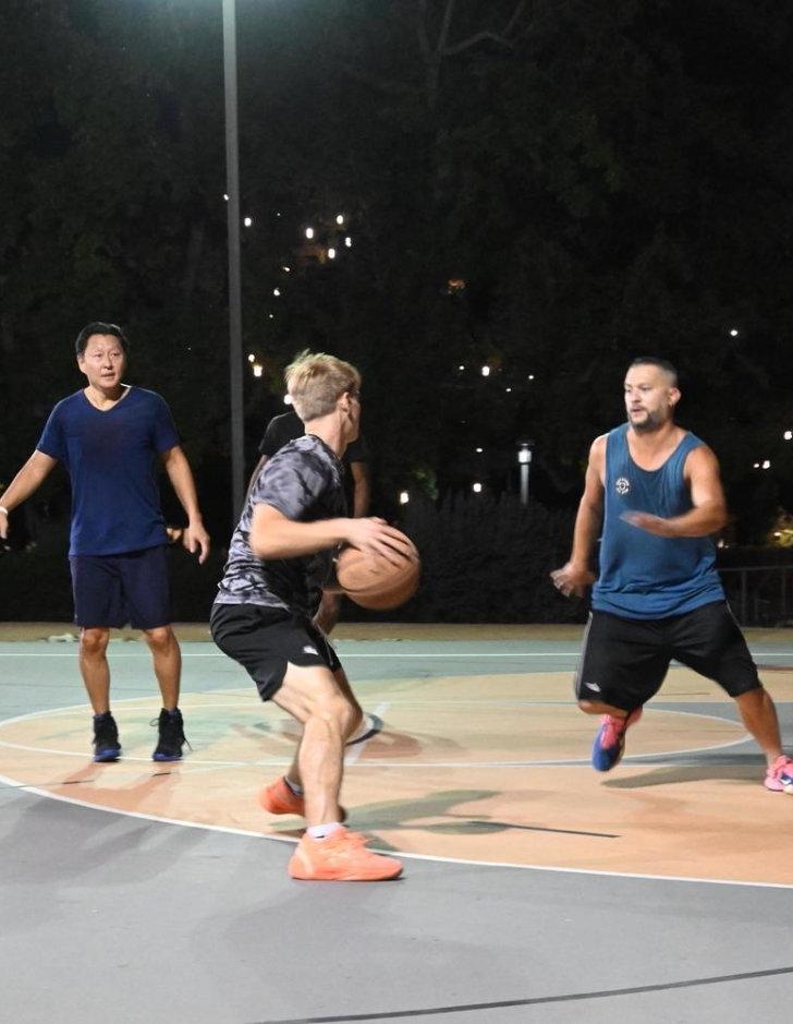 Pitzer students play a pickup game of basketball outside McConnell Center.